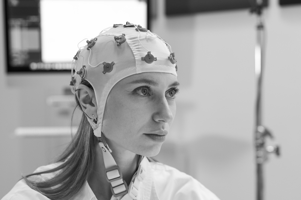 Lady wearing EEG cap